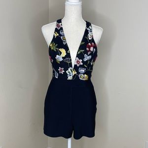 BeBe sleeveless deep V neck black romper
